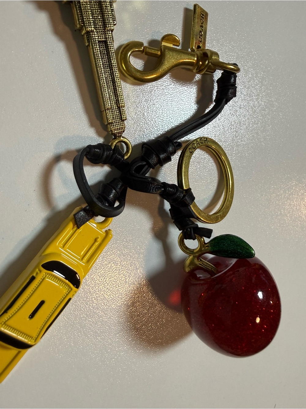 Coach Black Leather & Gold Hardware Charm Key Fob with Red Apple and Yellow Taxi